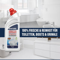 Thumbnail for  Flasche Binford Urinstein Entferner vor weißem Badezimmer mit Waschbecken, Toilette und Bidet