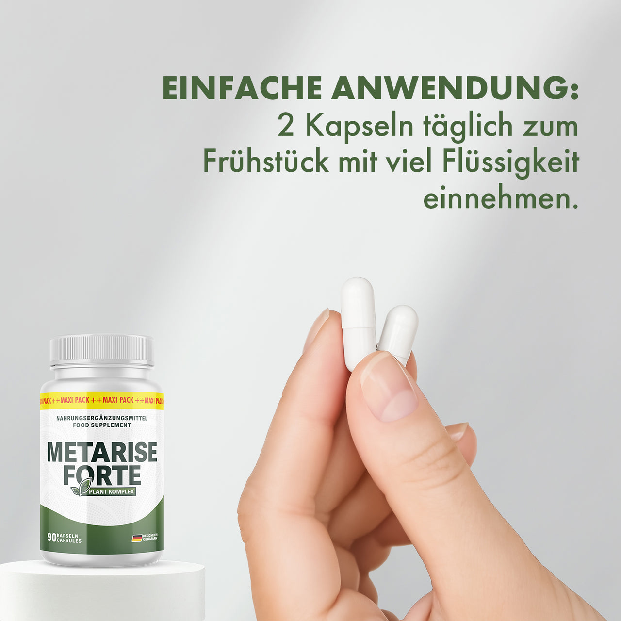 Hand hält zwei Kapseln vor Metarise Forte Dose Hinweis 2 Kapseln täglich einnehmen