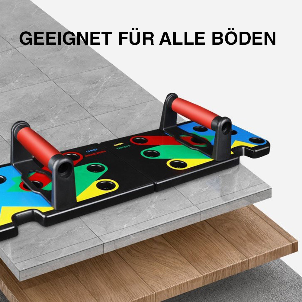 Schwarze Push-up-Platte mit roten Griffen auf Fliesen, Laminat und Teppich dargestellt