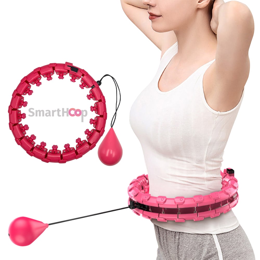 Frau mit Smart Hoop Fitness-Reifen mit Gewicht zum Training der Taille, pinkes Modell in Anwendung